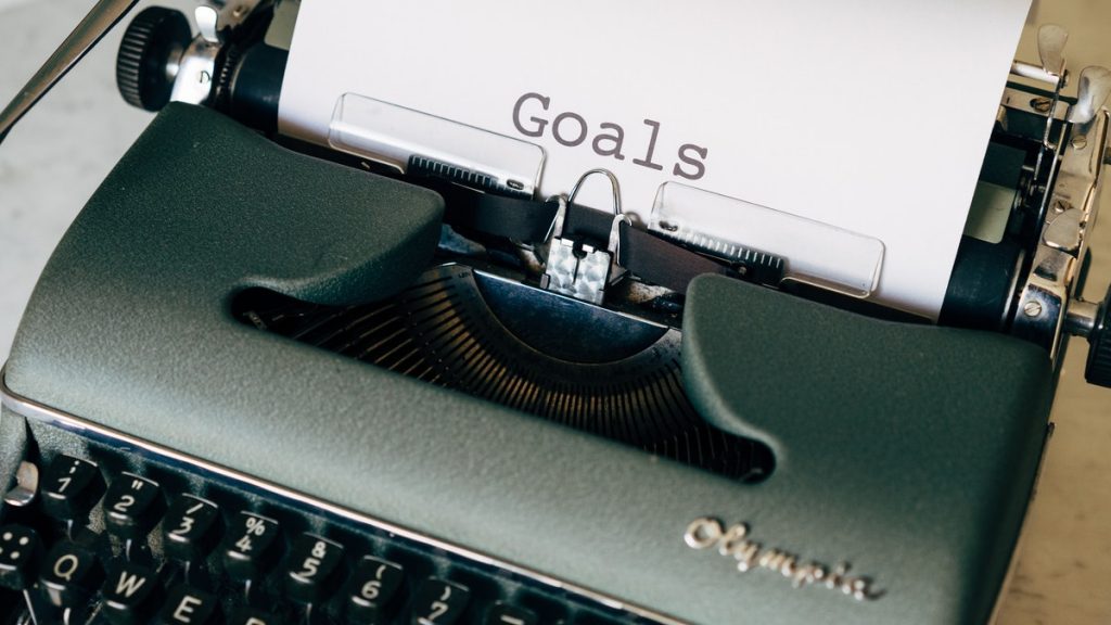 typewriter with the word goals Social Emotional Learning Empower Generations