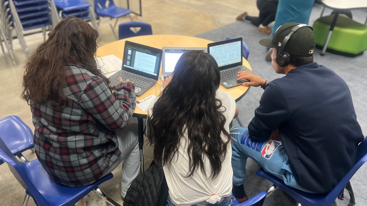 9-12 Working on Laptops 3.2025 Empower Generations