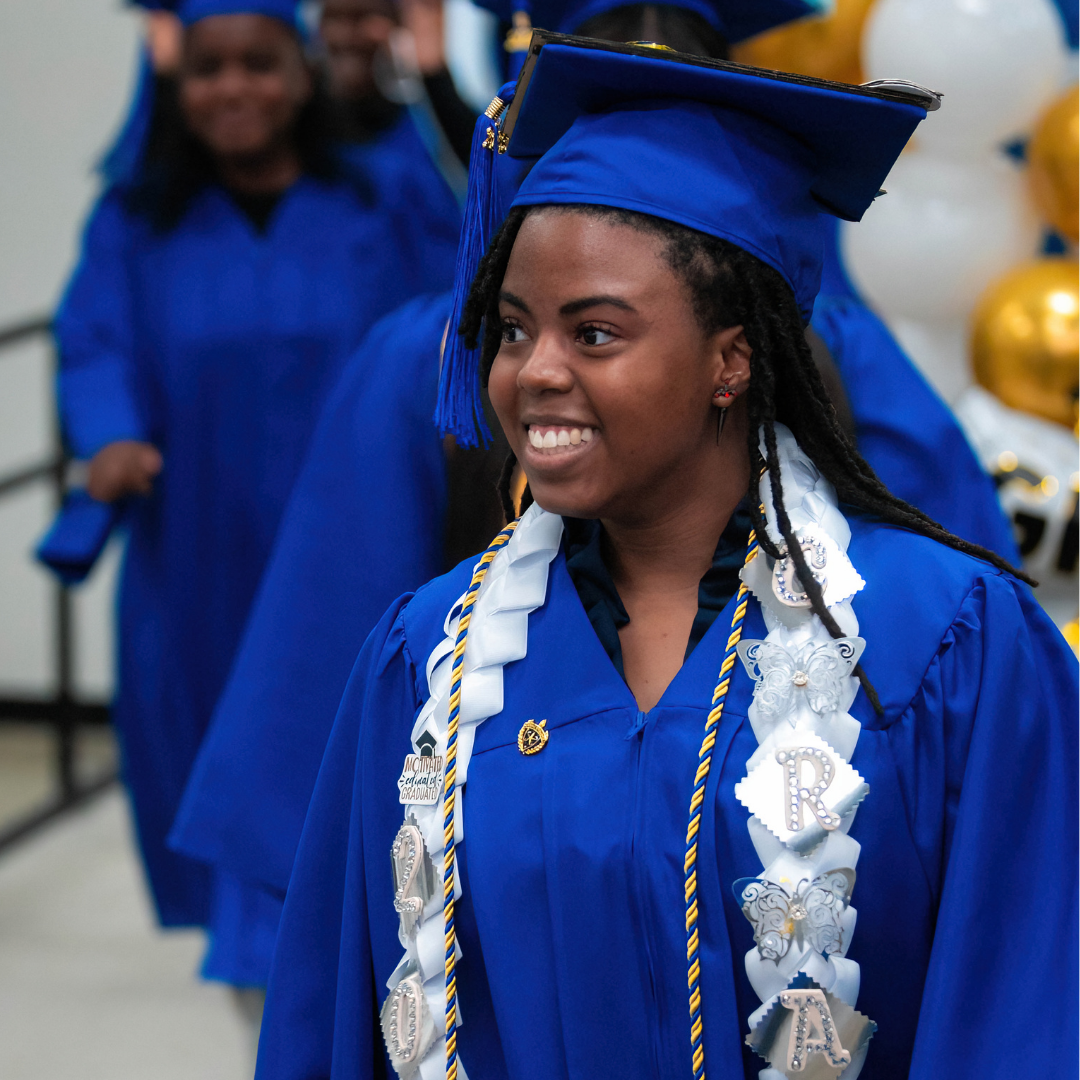 A graduate at the Empower Generations commencement ceremony