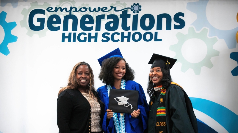 Empower Generations graduates with staff at the commencement ceremony